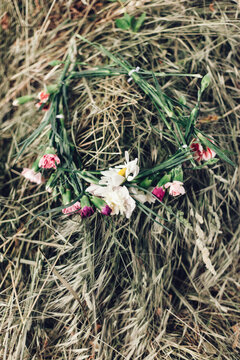 Flower wreath on a hay