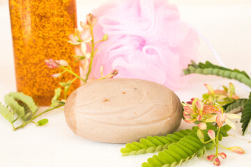 Obraz na płótnie Canvas tamarind herbal soap and liquid soap health care for body skin decoration on background white 
