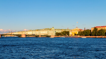 Winter Palace on the embankment of Neva river and Palace bridge in Saint Petersburg, Russia.