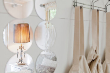 Reflection of lamp in mirror