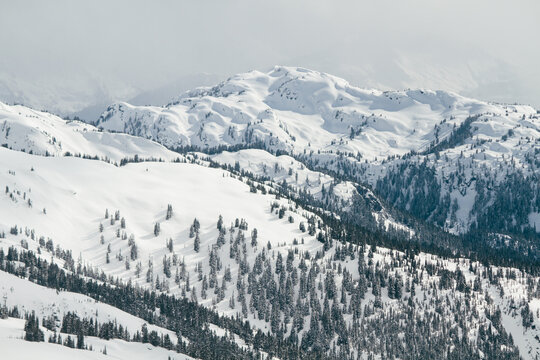 Mountains with snow landscape. Backcountry aerial view