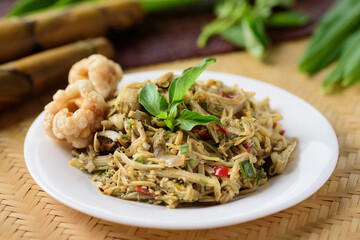 Northern Thai food (Yum Nor Mai), Spicy bamboo shoot salad with crab paste eating with pork rind, basil and ginger leaf, Local Thai food