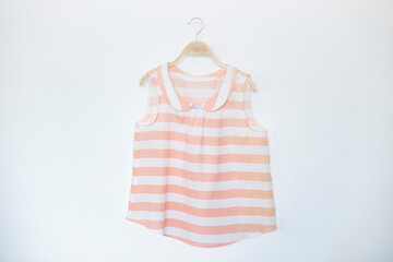 Woman blouse with Pink blouse cotton on white background.