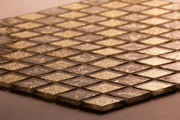 patterned construction tiles on a light background