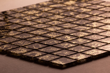 patterned construction tiles on a light background