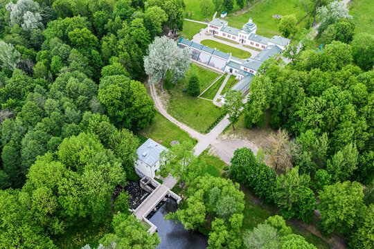 ZALESSE, BELARUS - JUNE 7, 2020: Old manor with beautiful park of the famous composer Michal Oginsky. Was built in 1822. Travel in Belarus. Top down aerial view.