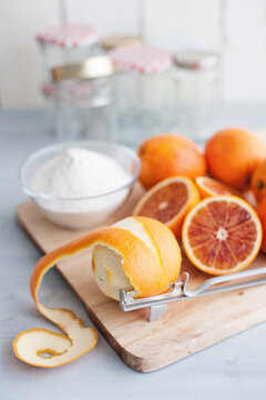 Food: Making of Bitter Orange Marmalade, peeling Oranges