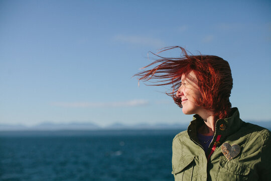 Wind swept hair on the ocean.