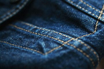 Jeans denim texture close up , focus only one point , soft blured background wallpaper