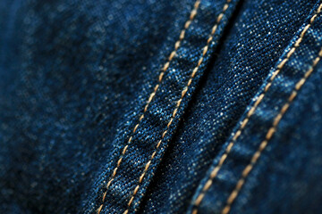 Jeans denim texture close up , focus only one point , soft blured background wallpaper