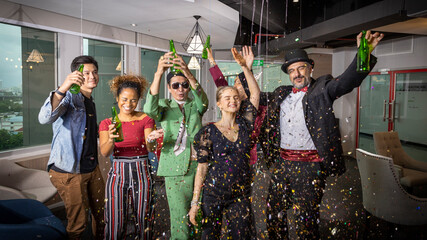 Business workers from different ethnicities celebrate a great achievement after long effort....