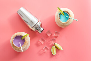 Tropical drink - coconut cocktail Margaritas or Pinacolada with ice and shaker
