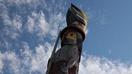 totem pole on the blue sky