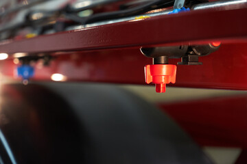Nozzles on the watering machine.