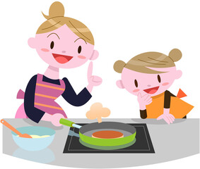 パンケーキを作る親子