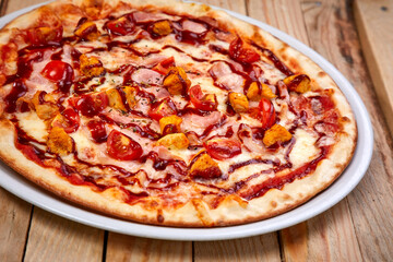 pizza on the wooden background