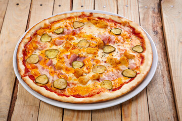 pizza on the wooden background