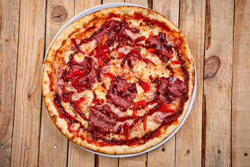 pizza on the wooden background