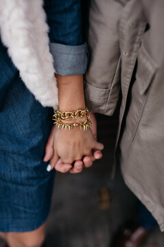 Lovers holding hands.