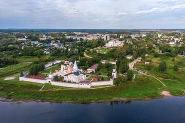 Fototapeta na wymiar Picturesque view of small ancient town Staritsa with Staritskiy Holy Dormition Monastery on the Volga River in Russia.