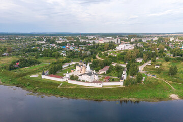 Fototapeta premium Picturesque view of small ancient town Staritsa with Staritskiy Holy Dormition Monastery on the Volga River in Russia.