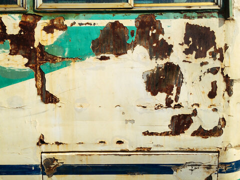 Details of a scraped out sdie of a bus
