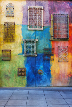 Colorful painted wall with decorative frames