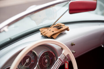Interior of a Classic, Retro Car With Leather Gloves on Dashboard