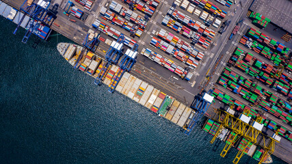 Fototapeta na wymiar Aerial view container ship in commercial port, Business industry commerce global import export logistic transportation oversea worldwide, Sea shipping company vessel.