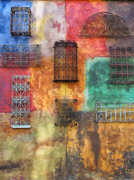 Colorful painted wall with decorative frames