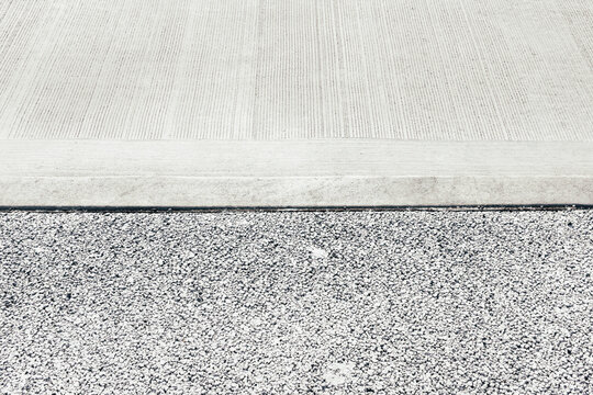 Detail of urban sidewalk and street curb