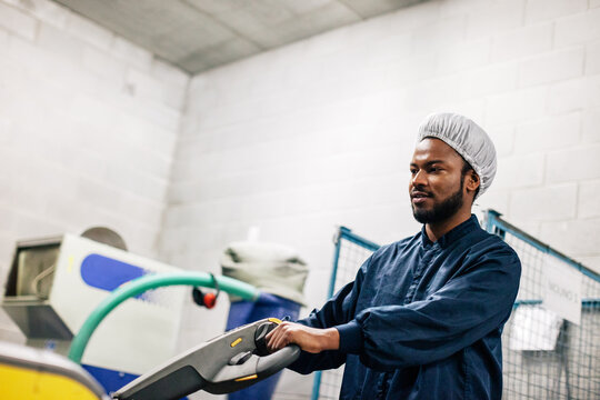 African american man working in a factory.