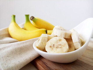 fresh bananas on wooden table.