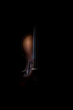 Violin on the black background