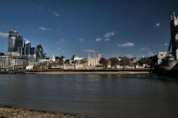 Fototapeta na wymiar The Tower of London across the river Thames