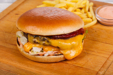 Burger with beef, cheese and iceberg salad