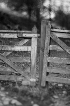 Closed wooden farm gates.