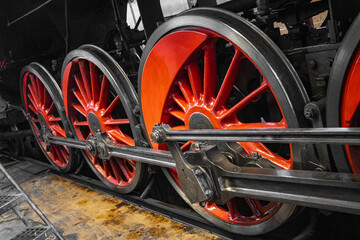 detail of a steam locomotive in a depot