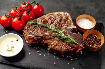 grill t-bone steak with on stone background