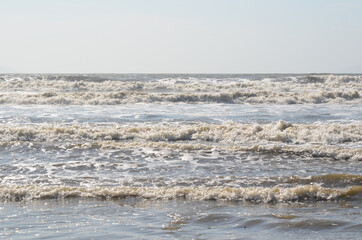 The restless sea or the sea after a storm. Waves and windy weather no people