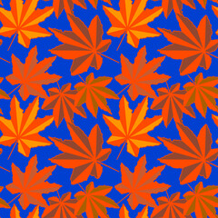 Red maple leaves. Seamless vector pattern on a blue background.
