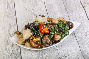 Pickled asian mushroom mux with herbs