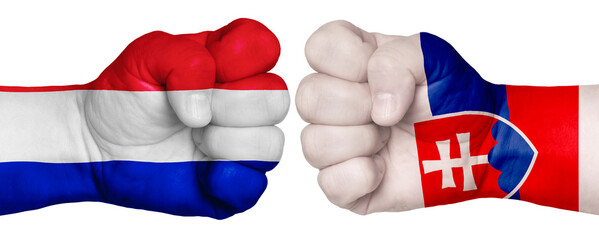 Two hands are clenched into fists and are located opposite each other. Hands painted in the colors of the flags of the countries. France vs Slovakia
