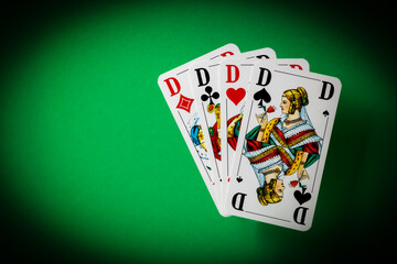 playing cards on green background