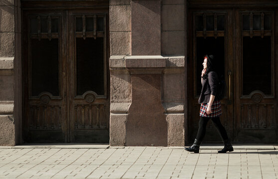 young woman walking on the street