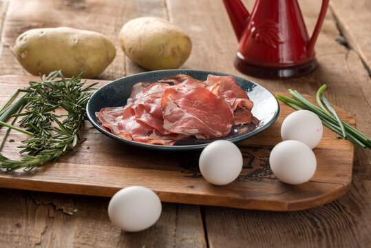 Breakfast: Ingredients for Baked Eggs on Coppa and Hash Browns