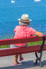 senior woman sitting on a bench