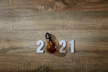 Numbers wood 2021 with led lighting on wooden