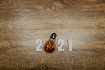 Numbers wood 2021 with led lighting on wooden