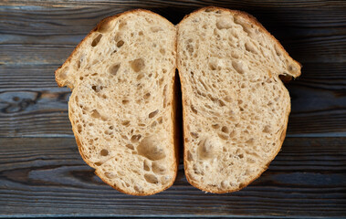 Homemade tartine bread on dark wooden table